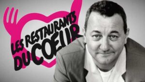 Coluche et le logo des Restos du Coeur